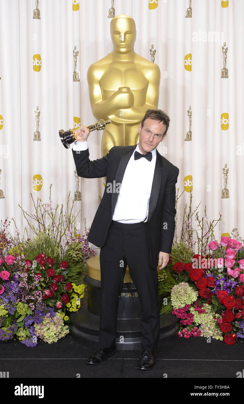 Chris Terrio poses with his Oscar for Adapted Screenplay for 
