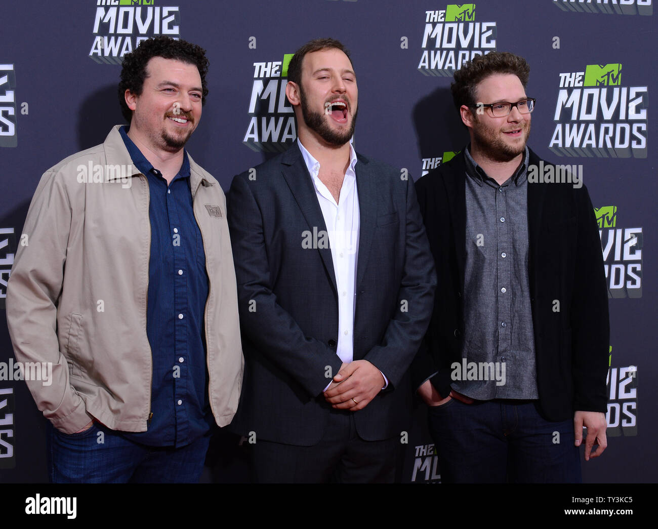 Actor Danny McBride, director Evan Goldberg and actor Seth Rogen arrive for The MTV Movie Awards at Sony Picture Studios in Culver City, California on April 14, 2013.  UPI/Jim Ruymen Stock Photo