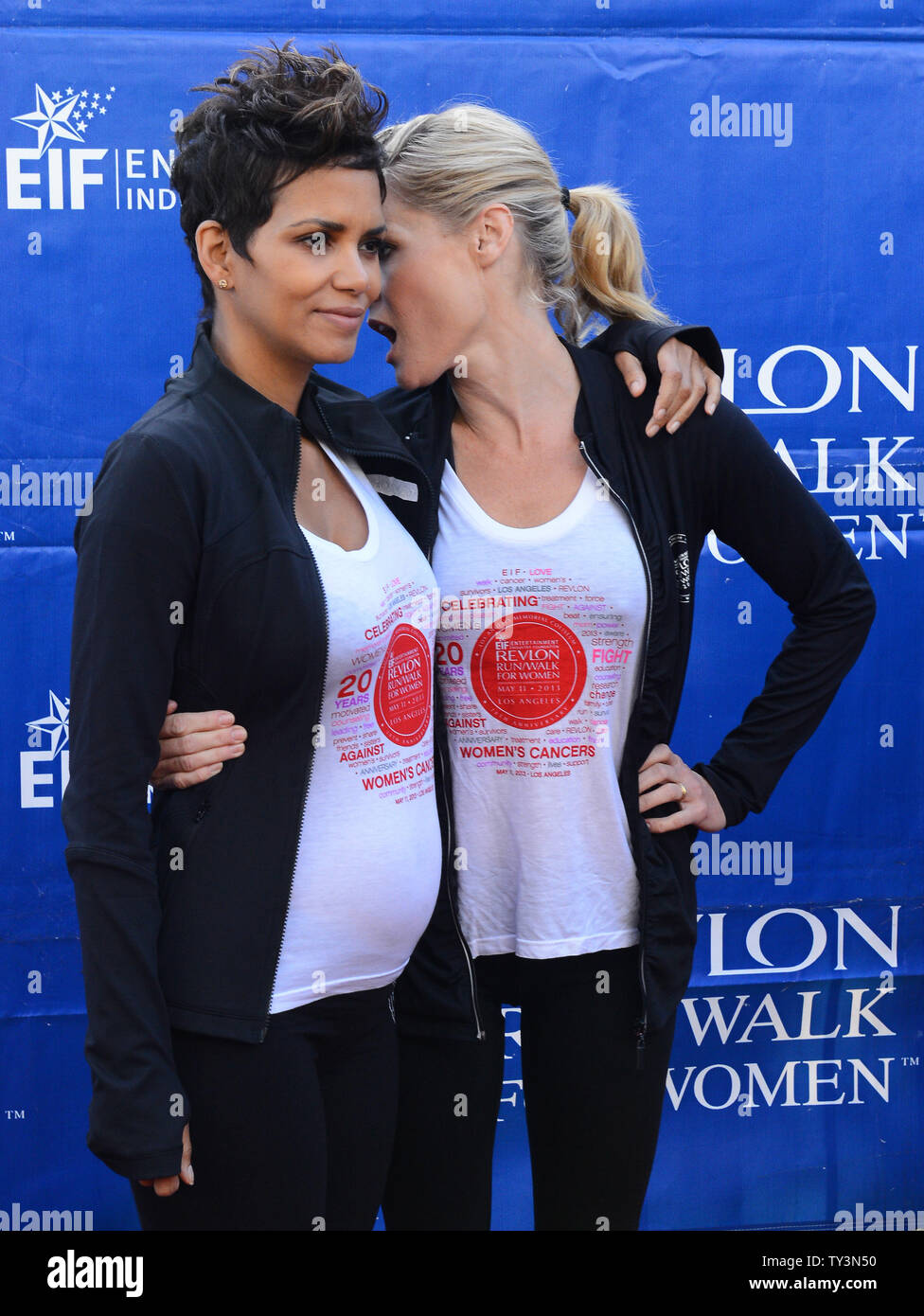 Actresses Halle Berry (L) and Julie Bowen participate in the 20th annual EIF Revlon Run/Walk for Women at the Los Angeles Memorial Coliseum in Los Angeles on May 11, 2013.  UPI/Jim Ruymen Stock Photo