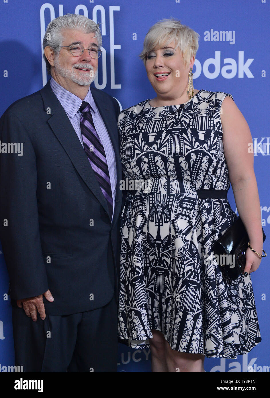 Director George Lucas and his daughter Katie Lucas arrive for the Women In Film Crystal + Lucy Awards at the the Beverly Hilton Hotel in Beverly Hills, California on June 12, 2013. UPI/Jim Ruymen Stock Photo