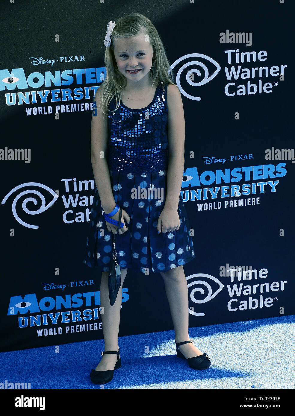Isabella Cramp arrives for the “Monsters University” premiere at the El