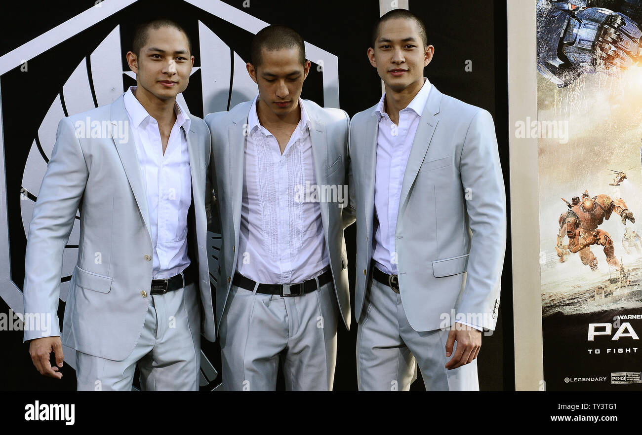 The Luu triplets (R-L) Lance, Charles, and Mark arrive for the ...