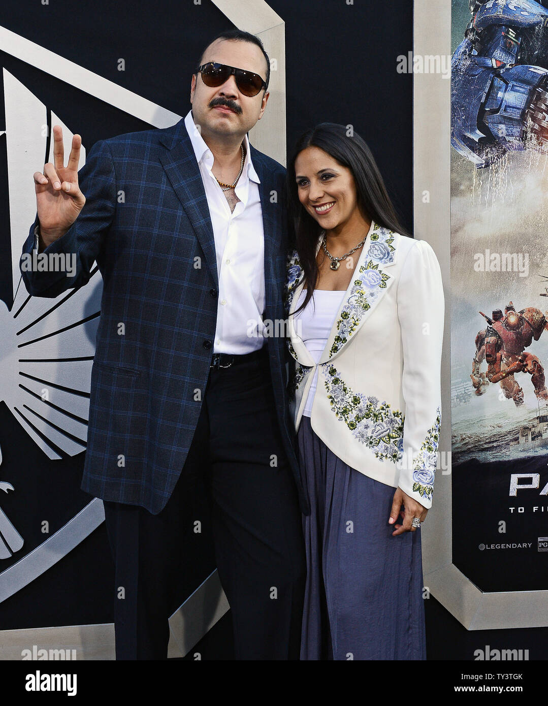 Pepe Aguilar and Aneliz Aguilar arrive for the premiere of Pacific Rim