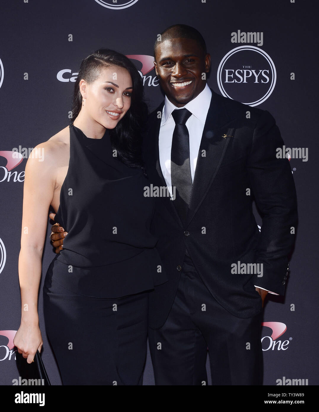 NFL player Reggie Bush and his girlfriend Lilit Avagyan attend the 2013 ESPY Awards at the Nokia Theatre L.A. Live in Los Angeles on July 17, 2013.   UPI/Jim Ruymen Stock Photo