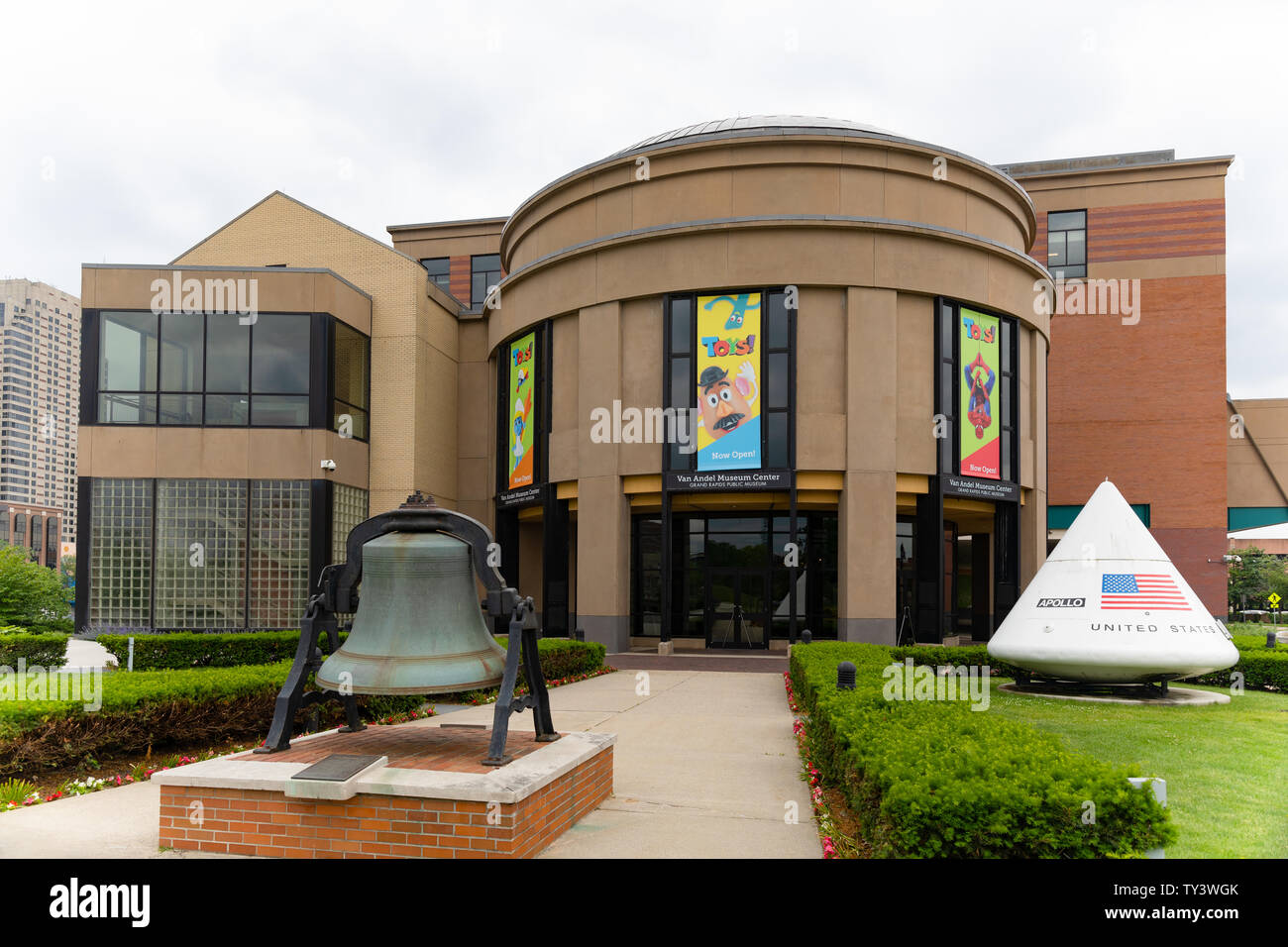 Grand Rapids , Michigan, USA - June 15, 2019: The  Andel Museum Center, Public Museum, with a space capsule and a historic bell at the entrance Stock Photo