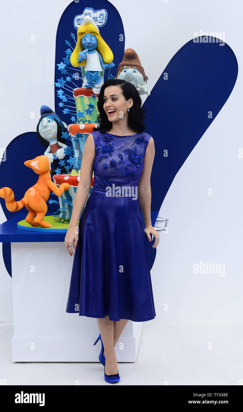 Singer and actress Katy Perry, the voice of Smurfette in the motion picture animated comedy 'The Smurfs 2', attends the premiere of the film at the Regency Village Theatre, in the Westwood section of Los Angeles on July 28, 2013. The Smurfs join forces with their human friends to rescue Smurfette, who has been kidnapped by Gargamel since she knows a secret spell that can turn the evil sorcerer's newest creation - creatures called the Naughties - into real Smurfs.  UPI/Jim Ruymen Stock Photo