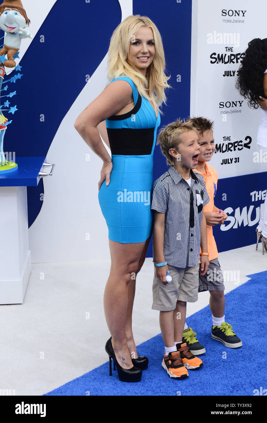 Singer Britney Spears, who performs 'Ooh La La' in the motion picture animated comedy 'The Smurfs 2', attends the premiere of the film with sons  Sean Federline (L) and Jayden James Federline at the Regency Village Theatre, in the Westwood section of Los Angeles on July 28, 2013. The Smurfs join forces with their human friends to rescue Smurfette, who has been kidnapped by Gargamel since she knows a secret spell that can turn the evil sorcerer's newest creation - creatures called the Naughties - into real Smurfs.  UPI/Jim Ruymen Stock Photo