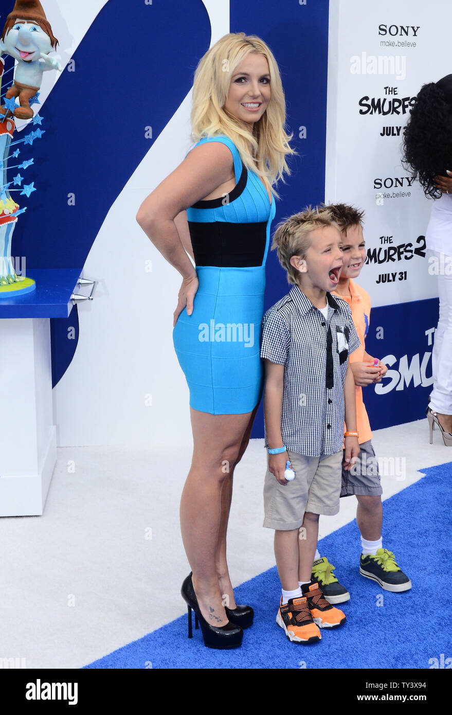 Singer Britney Spears, who performs 'Ooh La La' in the motion picture animated comedy 'The Smurfs 2', attends the premiere of the film with sons  Sean Federline (L) and Jayden James Federline at the Regency Village Theatre, in the Westwood section of Los Angeles on July 28, 2013. The Smurfs join forces with their human friends to rescue Smurfette, who has been kidnapped by Gargamel since she knows a secret spell that can turn the evil sorcerer's newest creation - creatures called the Naughties - into real Smurfs.  UPI/Jim Ruymen Stock Photo