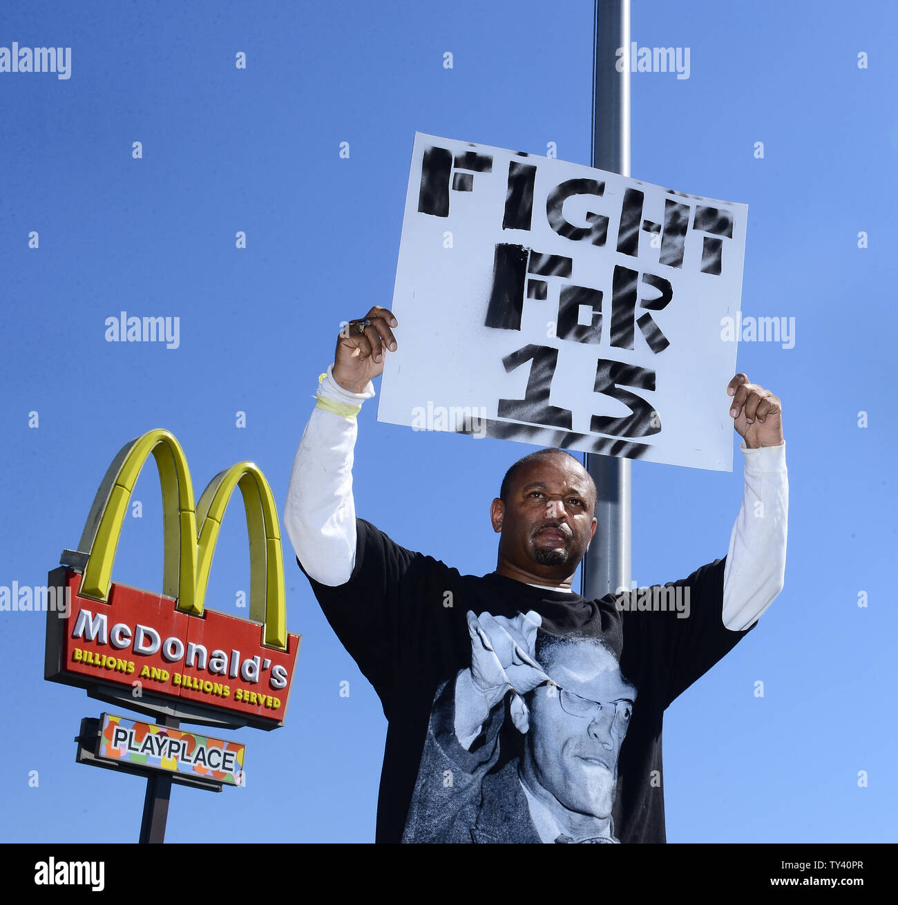 Najee Ali joins fast food workers in the Los Angeles area as they began their first strike today, part of a nationwide attempt to raise the federal minimum wage to $15 per hour and form a union. Organizers claim fast food workers are forced to rely on public assistance just to make ends meet.''  UPI/Jim Ruymen Stock Photo