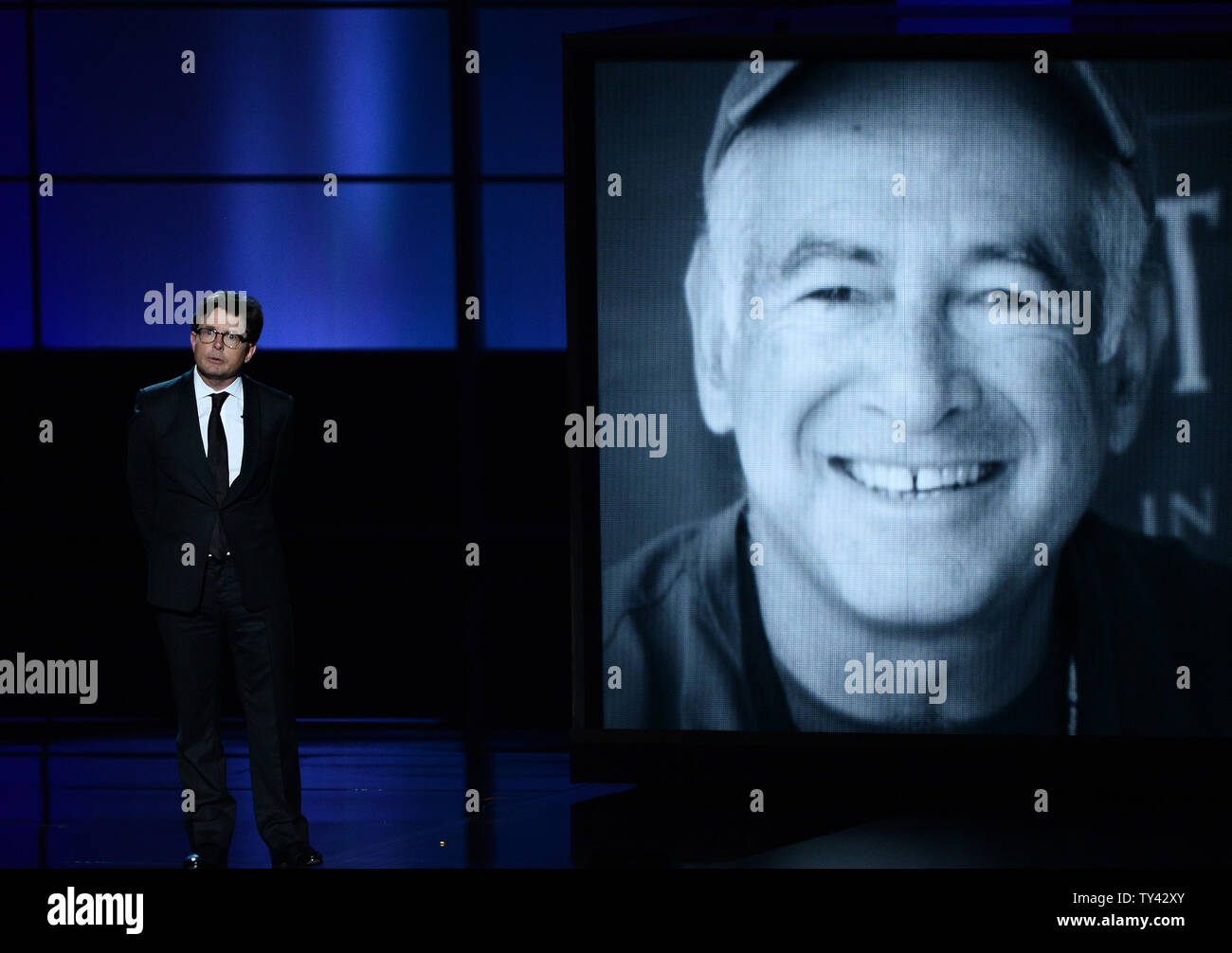 Producer Gary David Goldberg is remembered by actor Michael J. Fox during a memoriam at the 65th annual Primetime Emmy Awards at Nokia Theatre in Los Angeles on September 22, 2013.   UPI/Jim Ruymen Stock Photo