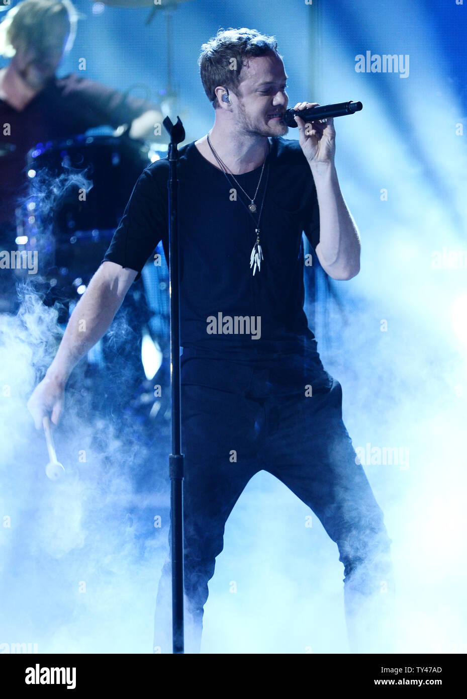Singer Dan Reynolds Of Imagine Dragons Performs Onstage At The 41st Annual American Music Awards Held