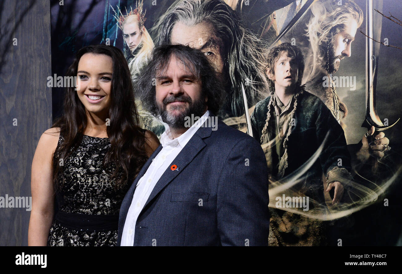 Writer, producer, and director Peter Jackson attends with his daughter, Katie, the premiere of 'The Hobbit: The Desolation of Smaug' at TCL Chinese Theatre in the Hollywood section of Los Angeles on December 2, 2013. The dwarves, along with hobbit Bilbo Baggins and wizard Gandalf the Grey, continue their quest to reclaim their ancient homeland, Erebor, from Smaug.  Bilbo Baggins posseses a powerful and magical ring.  The movie is another 'Hobbit' story in the tradition of the 'Lord of the Rings' trilogy from novelist J.R.R. Tolkien.  UPI/Jim Ruymen Stock Photo