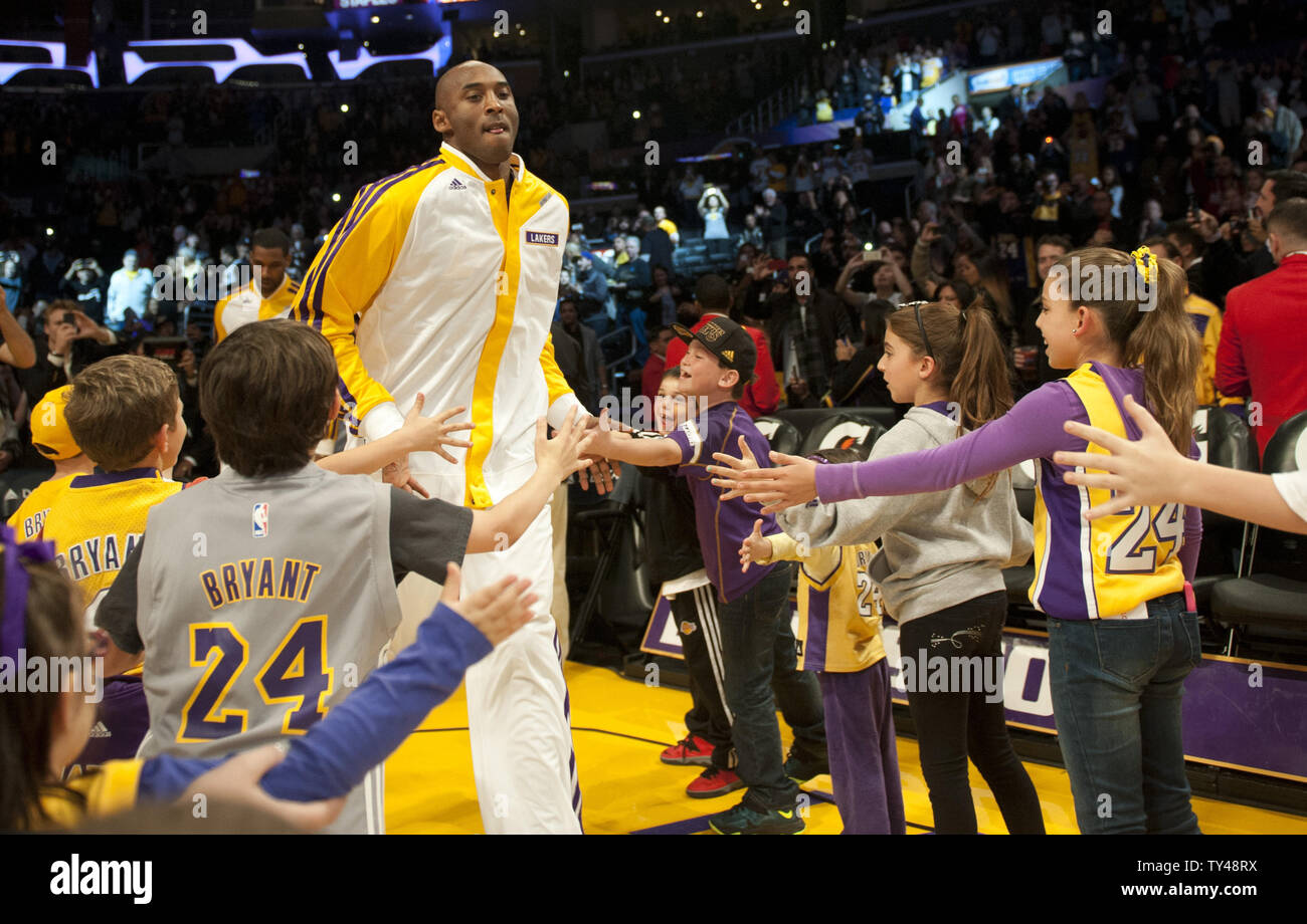 Los Angeles Lakers' Kobe Bryant comes out on the court for the game against the Toronto Raptors at Staples Center in Los Angeles on December 8, 2013. UPI/Lori Shepler Stock Photo