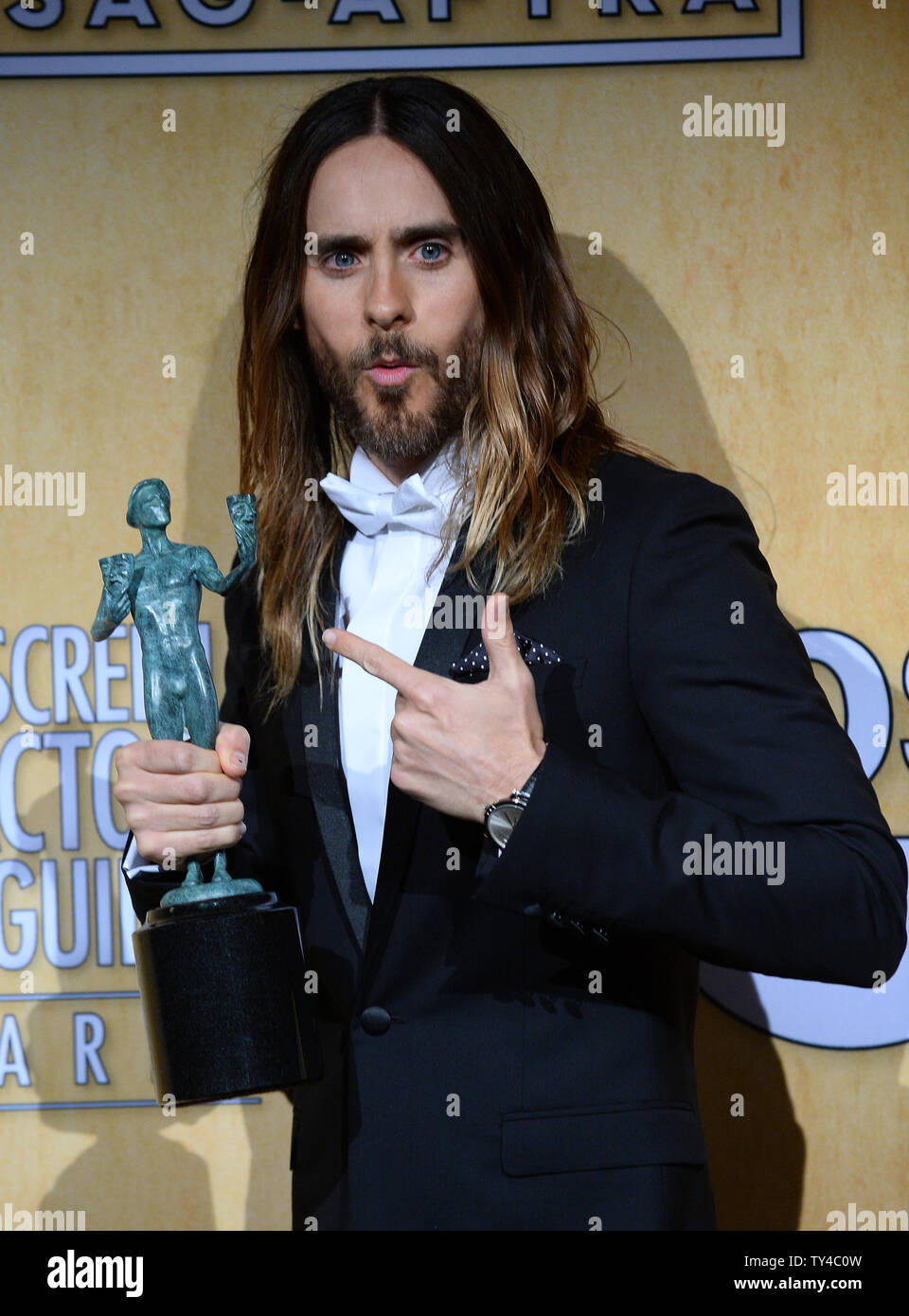 Actor Jared Leto Holds The Award He Won For Best Actor In A Supporting Role Dallas Buyers Club Backstage At The 20th Annual Sag Awards Held At The Shrine Auditorium In