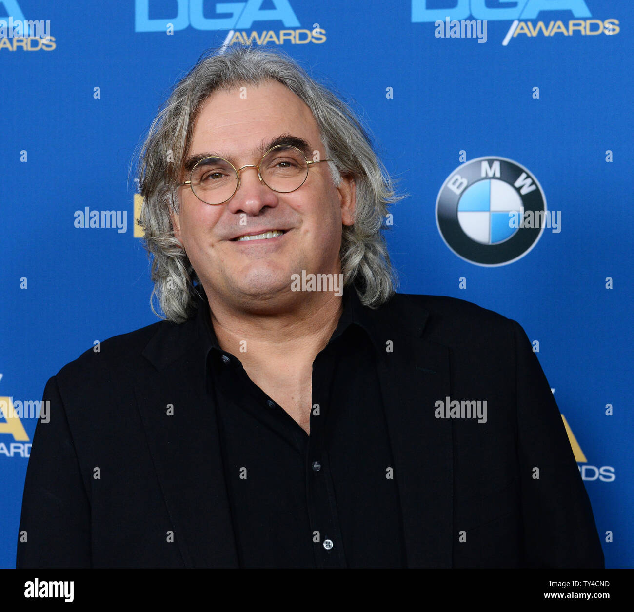 Director Paul Greengrass arrives on the red carpet for the 66th annual