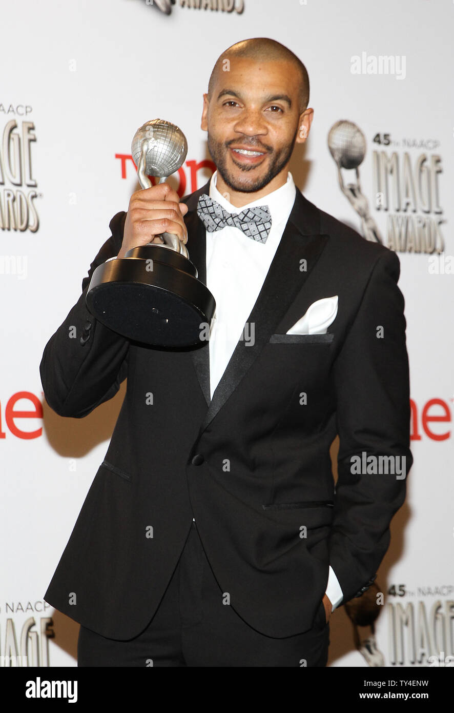 Actor Aaron D. Spears holds the award he won for Outstanding Actor in a ...
