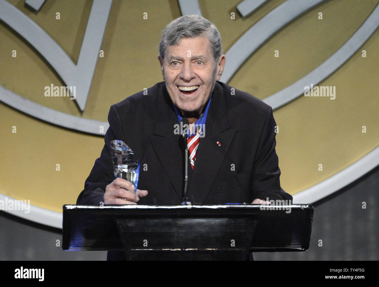 Jerry Lewis accepts the Lifetime Achievement award at the 51st Annual Publicists Awards Luncheon held at the Beverly Wilshire Hotel in Beverly Hills, California on February 28, 2014.      UPI/Phil McCarten Stock Photo