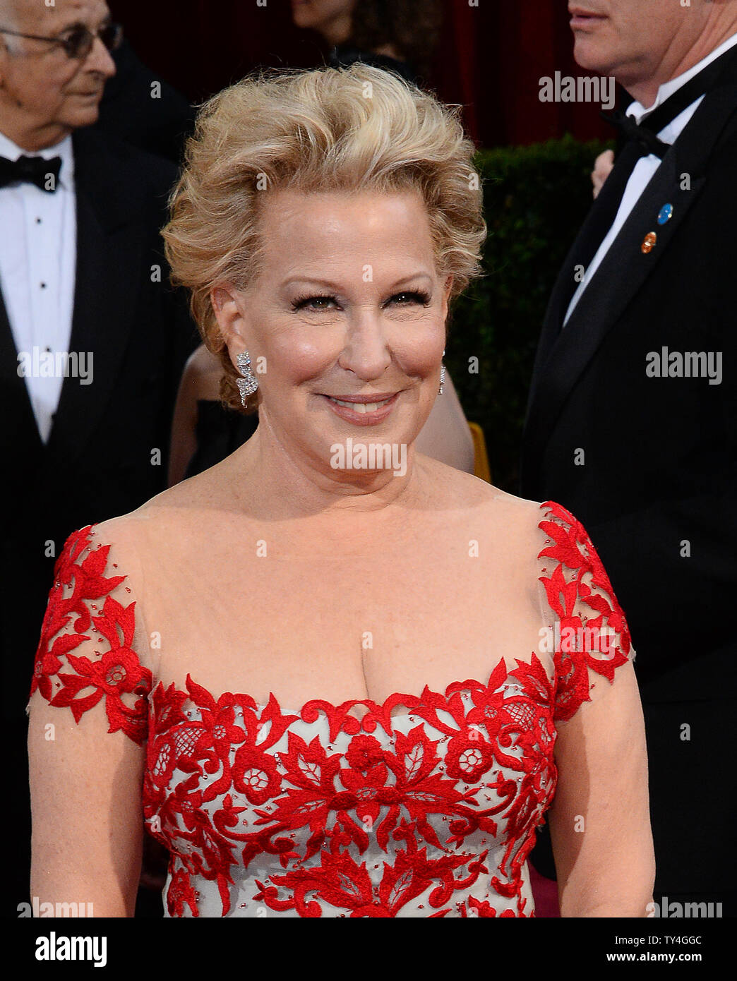 Actress Bette Midler arrives on the red carpet at the 86th Academy