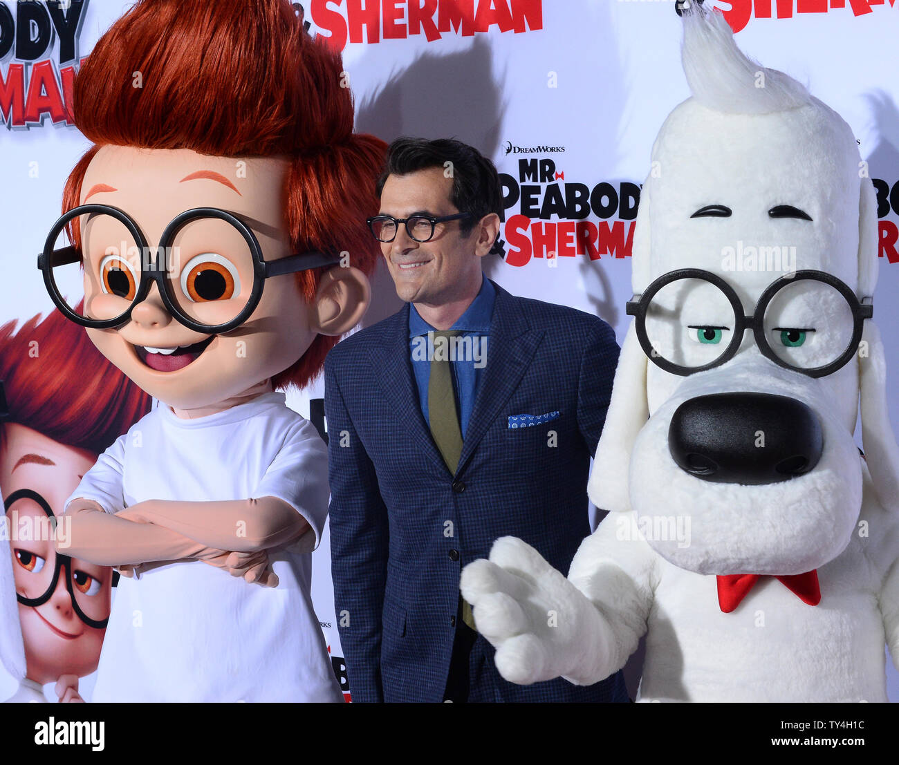 Cast member Ty Burrell, the voice of Mr. Peabody in the animated motion  picture Mr. Peabody & Sherman attends the premiere of the film at the  Regency Village Theatre in the Westwood section of Los Angeles March 5,  2014. Storyline: Mr. Peabody, the