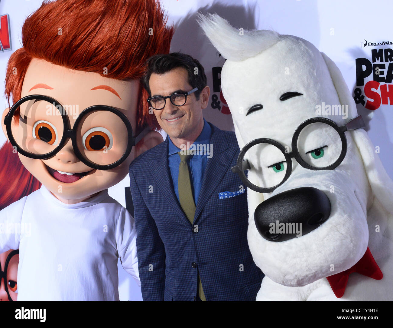 Cast member Ty Burrell, the voice of Mr. Peabody in the animated motion  picture Mr. Peabody & Sherman attends the premiere of the film at the  Regency Village Theatre in the Westwood section of Los Angeles March 5,  2014. Storyline: Mr. Peabody, the