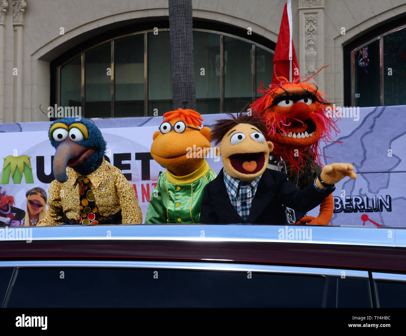 Muppet characters The Great Gonzo, Scooter, Walter and Animal (L-R) attend  the premiere of the motion picture comedy 