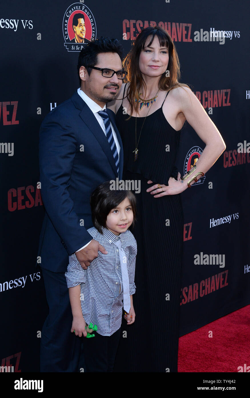 Cast member Michael Pena (L) attends the premiere of the motion picture  biography "Cesar Chavez" with his wife Brie Shaffer and their son Roman at  TCL Chinese Theatre in the Hollywood section