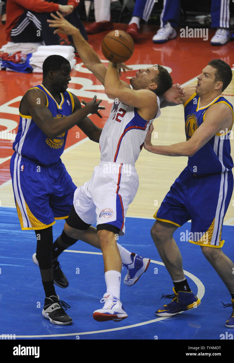 Los Angeles Clippers Forward Blake Griffin Middle Is Stopped By Golden State Warriors Forward Draymond Green Left And David Lee Right In The First Quarter Of Game 7 Of The Western Conference