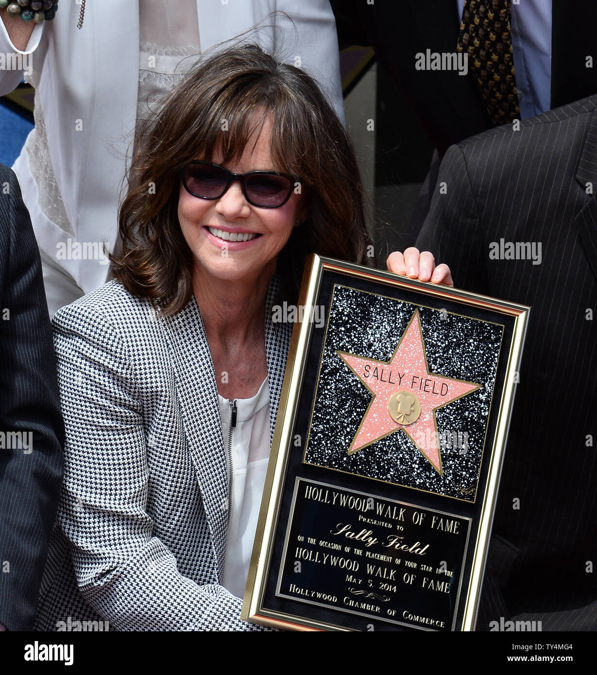 Actress Sally Field holds a replica plaque during an unveiling ceremony ...