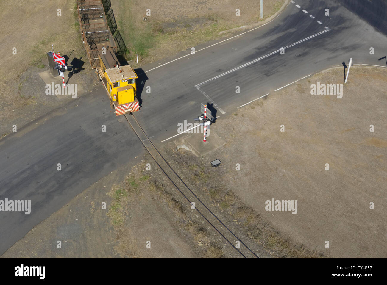 Aerial of empty cane train leaving Millaquin Mill Bundaberg Queensland Australia Stock Photo