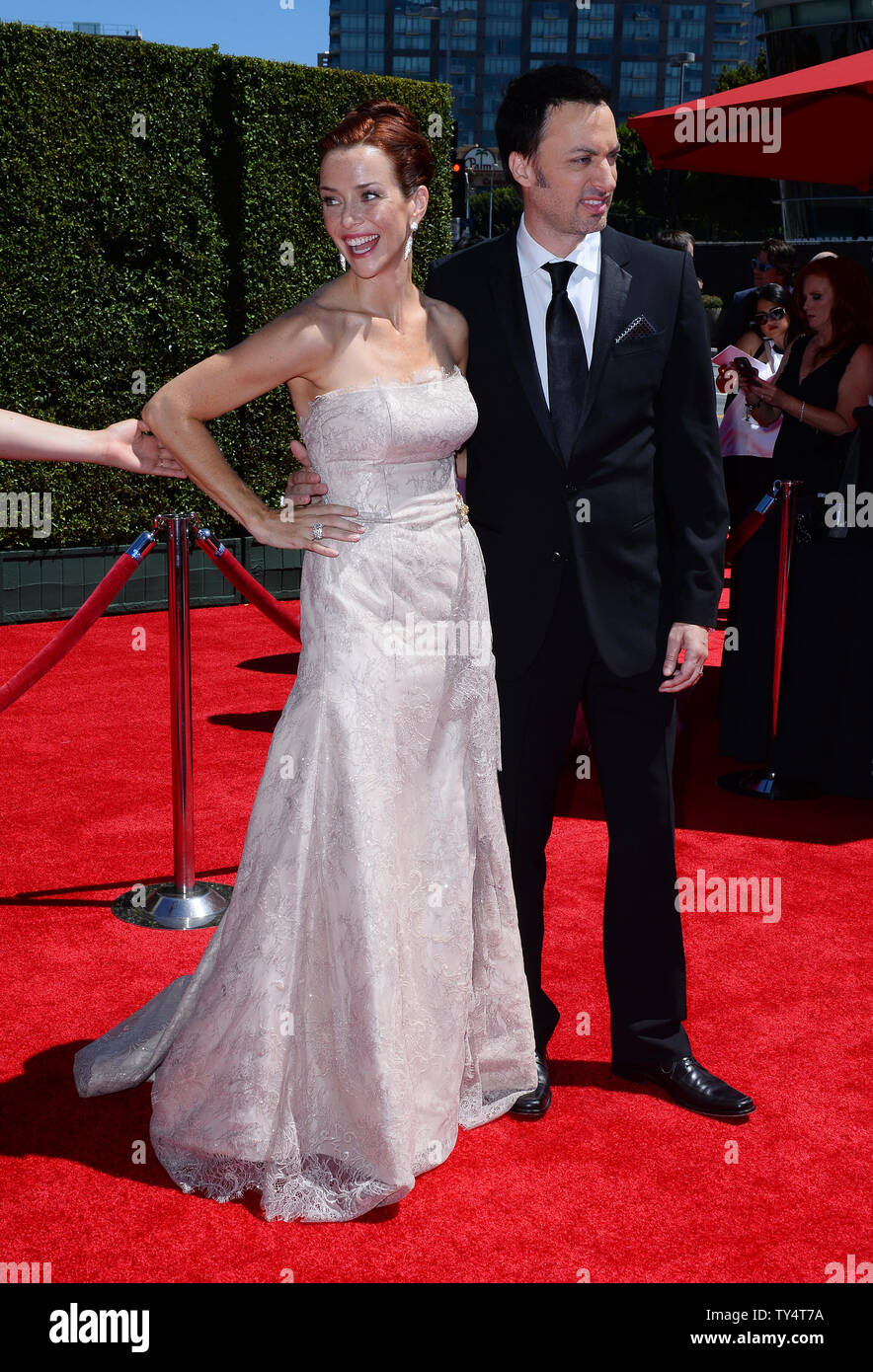 Actors Annie Wersching (L) and Stephen Full.attend the Creative Arts Emmy Awards at Nokia Theatre L.A. Live in Los Angeles on August 16, 2014. UPI/Jim Ruymen Stock Photo