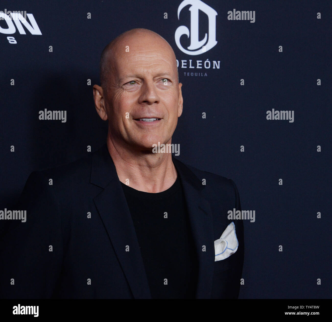 Cast member Bruce Willis attends the premiere of the motion picture crime thriller 'Sin City: A Dame to Kill For' attends the premiere of the film at TCL Chinese Theatre in the Hollywood section of Los Angeles on August 19, 2014. Storyline: Co-directors Robert Rodriguez and Frank Miller reunite to bring Miller's 'Sin City' graphic novels back to the screen. Weaving together two of Miller's classic stories with new tales, the town's most hard boiled citizens cross paths with some of its more notorious inhabitants.   UPI/Jim Ruymen Stock Photo