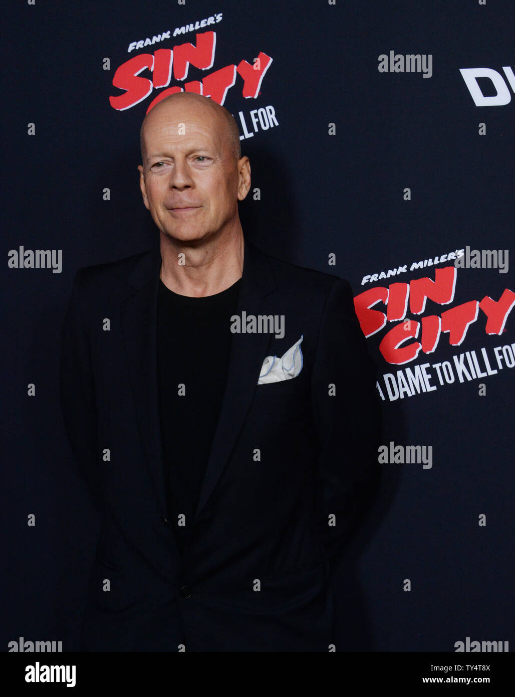 Cast member Bruce Willis attends the premiere of the motion picture crime thriller 'Sin City: A Dame to Kill For' attends the premiere of the film at TCL Chinese Theatre in the Hollywood section of Los Angeles on August 19, 2014. Storyline: Co-directors Robert Rodriguez and Frank Miller reunite to bring Miller's 'Sin City' graphic novels back to the screen. Weaving together two of Miller's classic stories with new tales, the town's most hard boiled citizens cross paths with some of its more notorious inhabitants.   UPI/Jim Ruymen Stock Photo