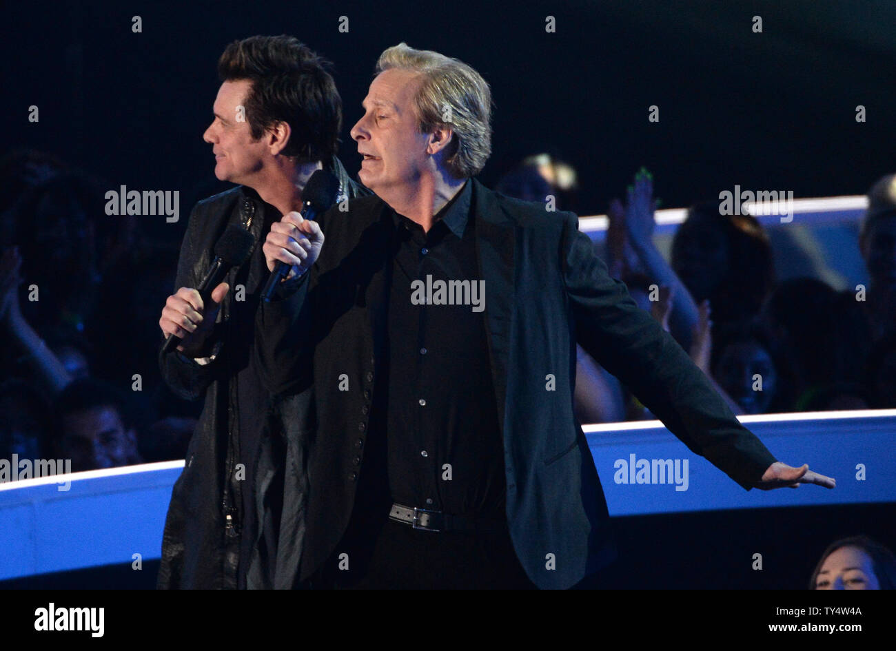 Actors Jim Carrey, left, and Dave Coulier present an award during the 2014 MTV Video Music Awards at the Forum in Inglewood, California on August 24, 2014.  UPI/Pat Benic Stock Photo