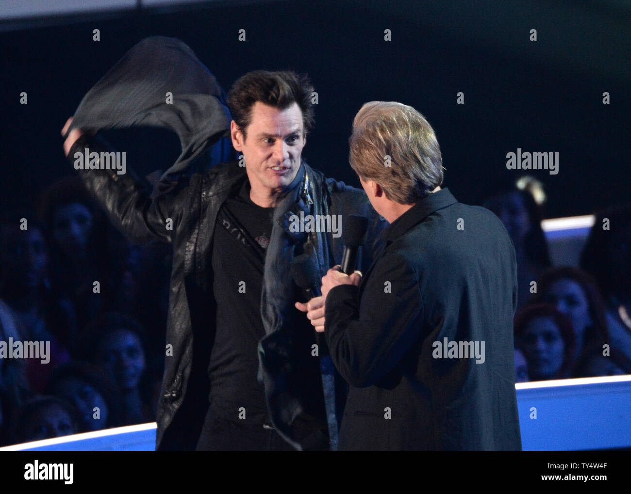 Actors Jim Carrey, left, and Dave Coulier present an award during the 2014 MTV Video Music Awards at the Forum in Inglewood, California on August 24, 2014.  UPI/Pat Benic Stock Photo