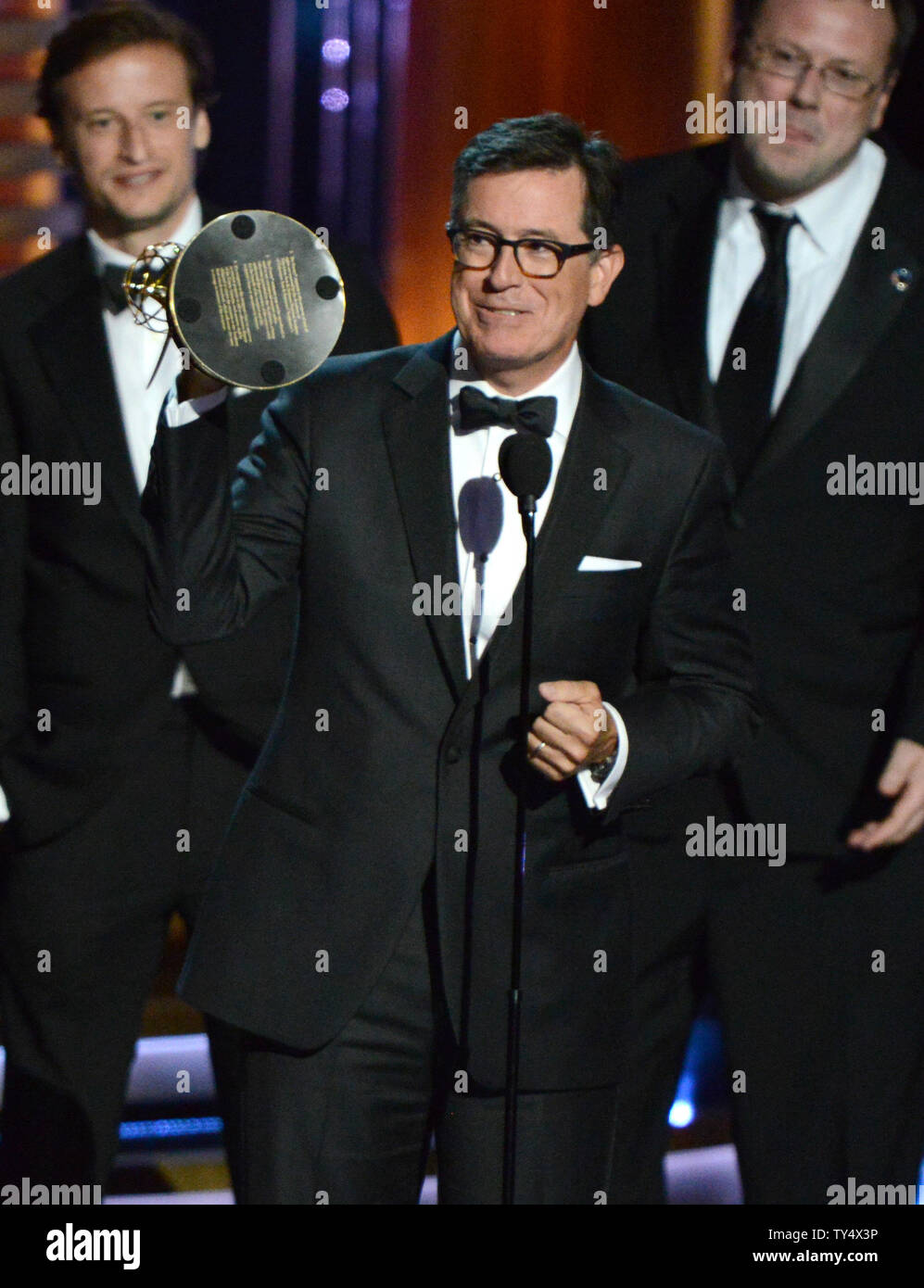 Stephen Colbert and the producers of  'The Colbert Report' accept the award for outstanding variety series  during the Primetime Emmy Awards at the Nokia Theatre in Los Angeles on August 25, 2014.     UPI/Pat Benic Stock Photo