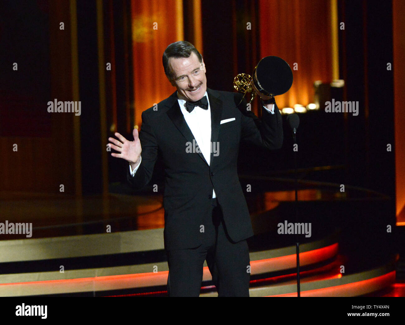 Bryan Cranston accepts the award for outstanding lead actor in a drama series for his work in 'Breaking Bad' during the Primetime Emmy Awards at the Nokia Theatre in Los Angeles on August 25, 2014.     UPI/Pat Benic Stock Photo