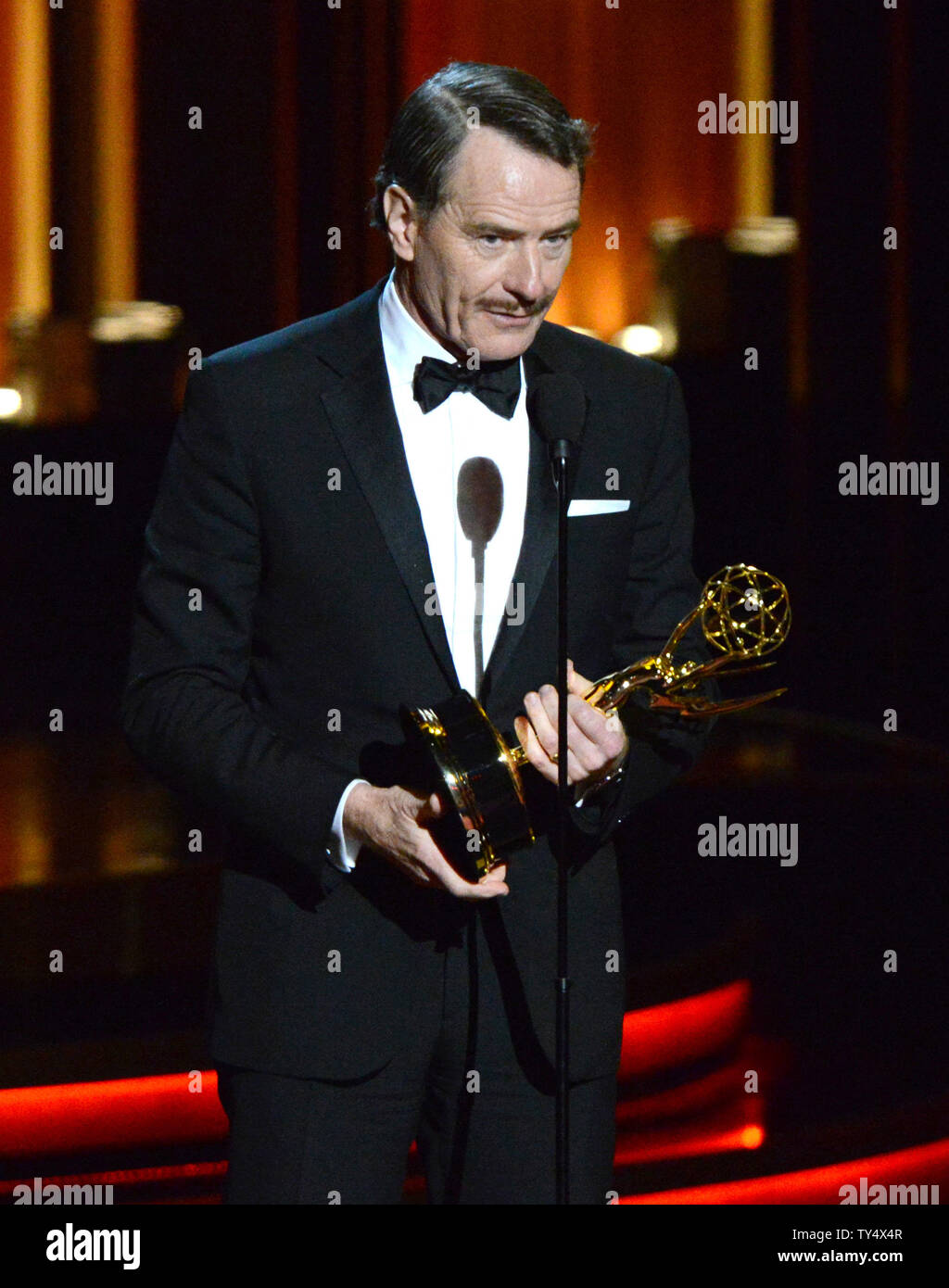 Bryan Cranston accepts the award for outstanding lead actor in a drama series for his work in 'Breaking Bad' during the Primetime Emmy Awards at the Nokia Theatre in Los Angeles on August 25, 2014.     UPI/Pat Benic Stock Photo