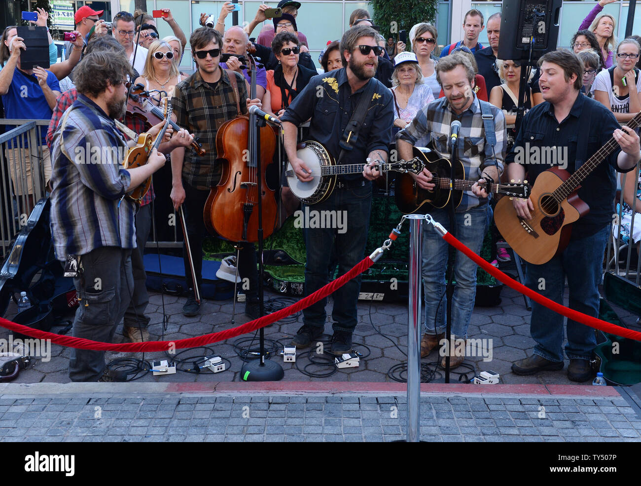 Ryan Young, Erik Berry, Dave Carroll, Tim Saxhaug and Dave Simonett of Trampled By Turtles attend the ceremony honoring John Denver with a posthumous star on the Hollywood Walk of Fame during an unveiling ceremony in Los Angeles on October 24, 2014.  UPI/Jim Ruymen Stock Photo