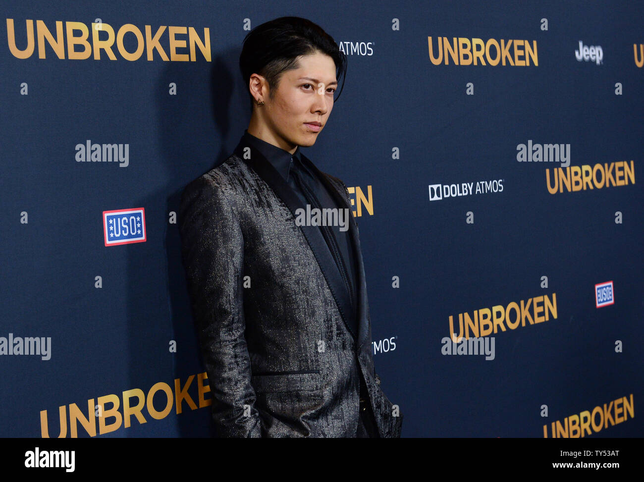 Cast member Takamasa Ishihara aka 'Miyavi' attends the premiere of the biographical motion picture war drama 'Unbroken' at the Dolby Theatre in the Hollywood section of Los Angeles on December 15, 2014. Storyline: After a near-fatal plane crash in WWII, Olympian Louis Zamperini spends a harrowing 47 days in a raft with two fellow crewmen before he's caught by the Japanese navy and sent to a prisoner-of-war camp.  UPI/Jim Ruymen Stock Photo