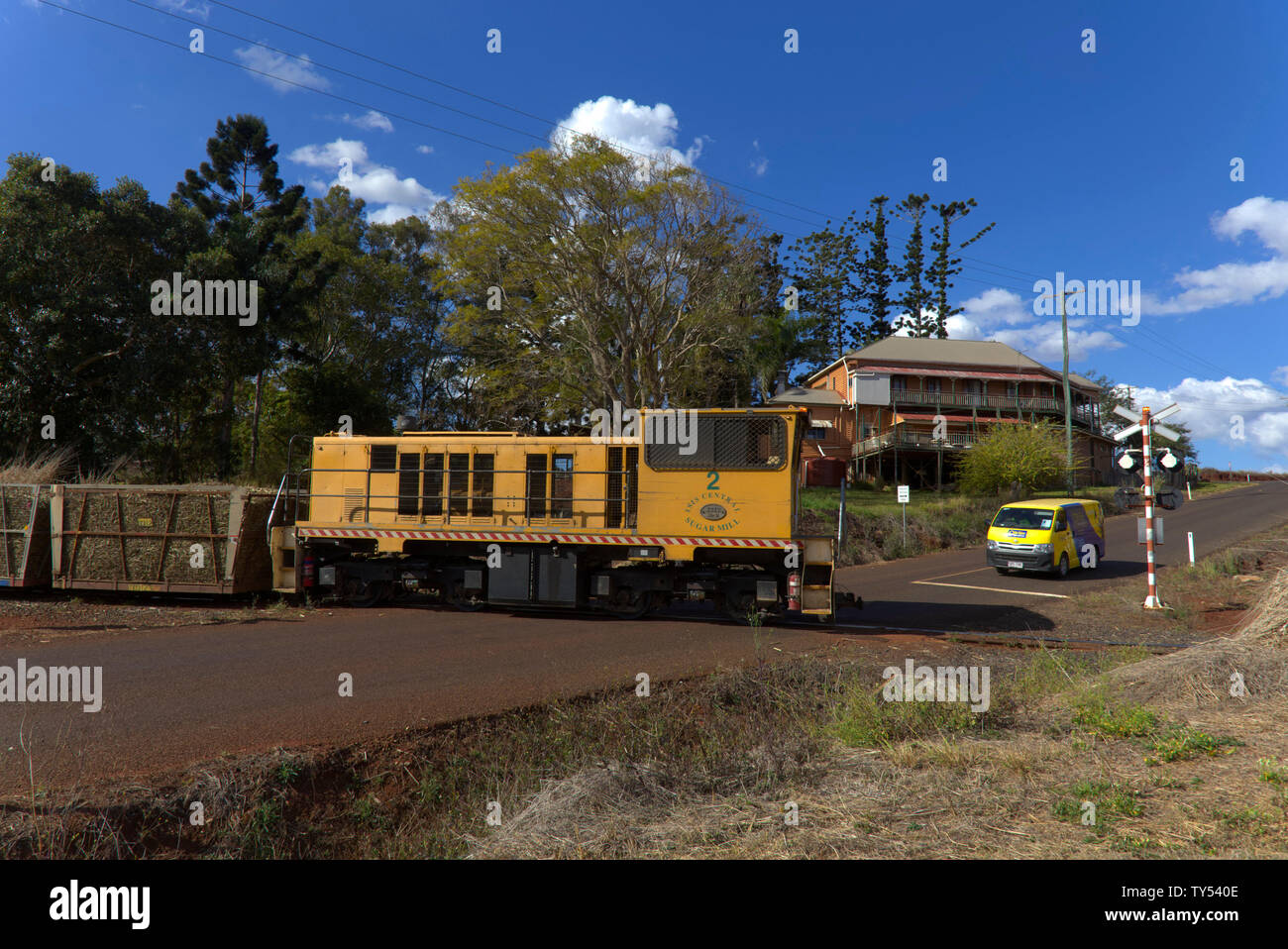 Fully loaded sugarcane train passing through Cordalba near Childers