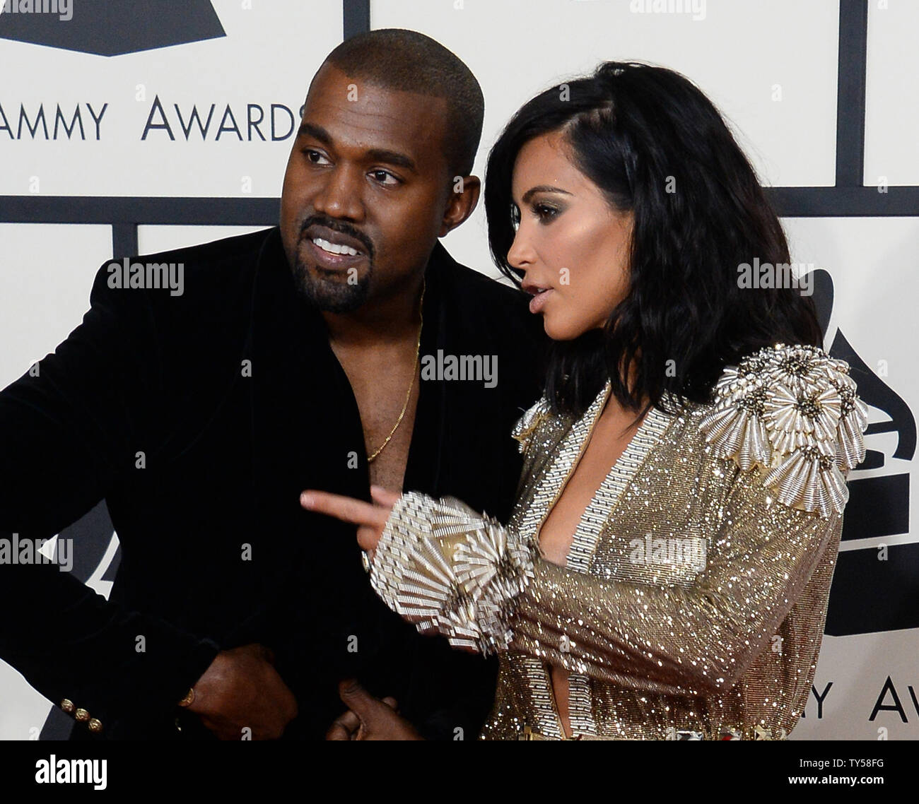 Rapper Kanye West and Kim Kardashian arrive for the 57th Grammy Awards ...