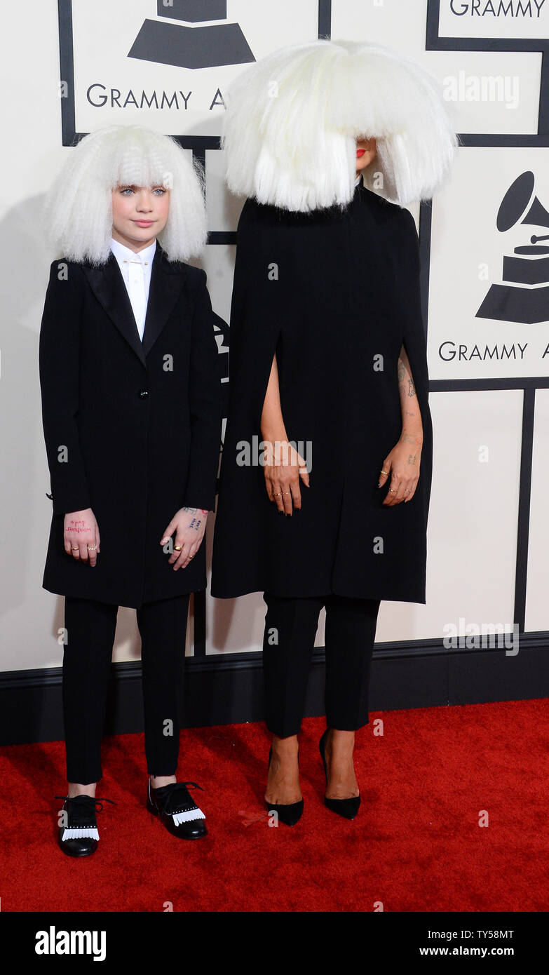 Dancer Maddie Ziegler (L) and singer-songwriter Sia arrive for the 57th
