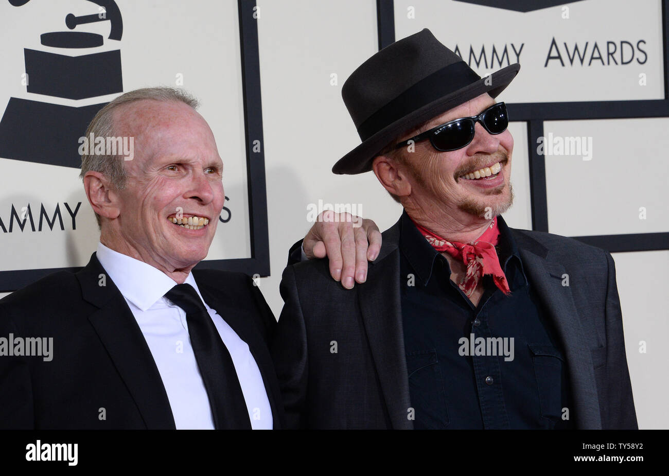 Phil Alvin, left, and Dave Alvin arrive for the 57th Grammy Awards at Staples Center in Los
