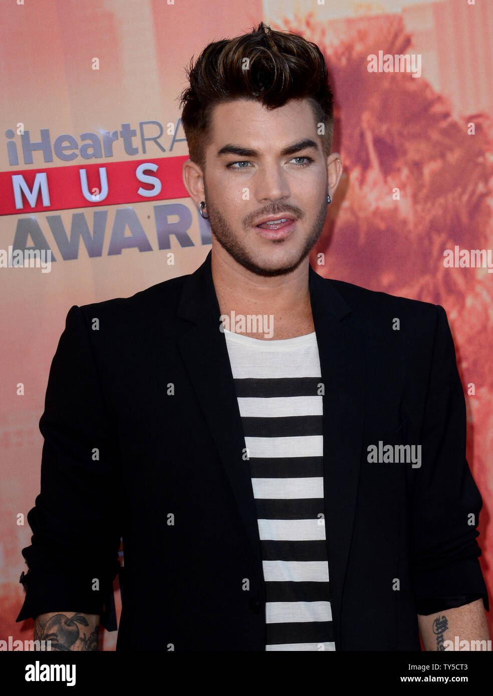 Singer Adam Lambert attends the iHeartRadio Music Awards at the Shrine ...