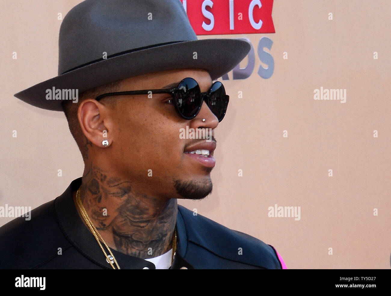 Singer Chris Brown attends the iHeartRadio Music Awards at the Shrine ...
