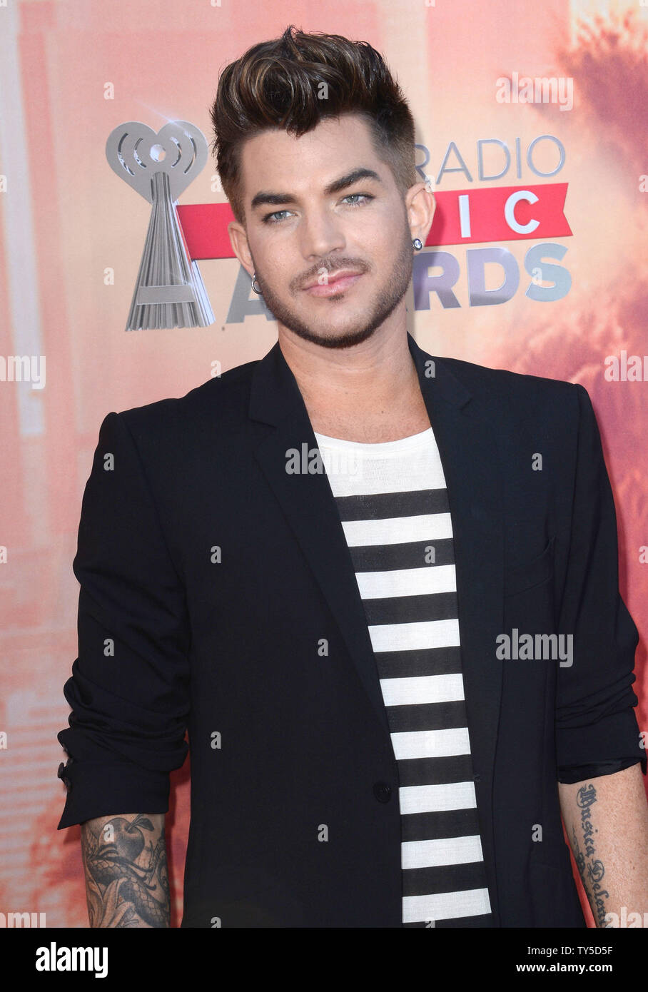 Singer Adam Lambert attends the iHeartRadio Music Awards at the Shrine ...