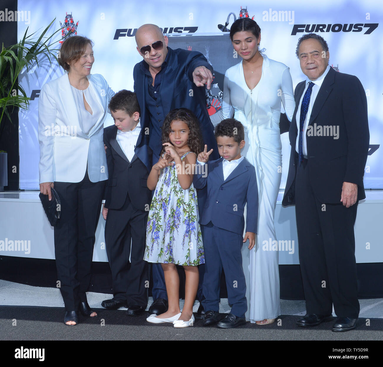 Actor Vin Diesel is joined by his wife, Mexican model Paloma Jimenez, daughter Hania Riley (C) and son Vincent Sinclair (R) and his mother Delora Vincent (L) and father Irving Vincent during a hand & footprint ceremony immortalizing Diesel in the forecourt of TCL Chinese Theatre (formerly Grauman's) in the Hollywood section of Los Angeles on April 1, 2015. Photo by /Jim Ruymen/UPI Stock Photo