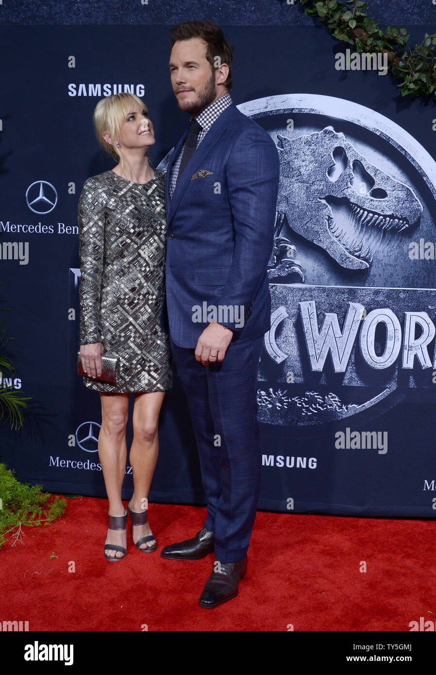 Cast member Chris Pratt and his wife, actress Anna Faris attend the premiere of the sci-fi motion picture thriller 'Jurassic World' at TCL Chinese Theatre in the Hollywood section of Los Angeles on June 9, 2015. Storyline:  Twenty-two years after the events of Jurassic Park, Isla Nublar now features a fully functioning dinosaur theme park, Jurassic World, as originally envisioned by John Hammond. After 10 years of operation and visitor rates declining, in order to fulfill a corporate mandate, a new attraction is created to re-spark visitor's interest, which backfires horribly.  Photo by Jim Ru Stock Photo