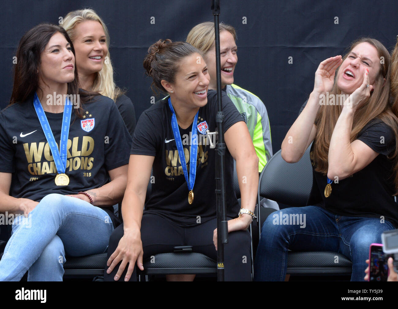 Fans, includingg Hope Solo (L) and Carli Lloyd (C) rally to celebrate the  2015 Women's World Cup victory at Microsoft Square in Los Angeles on July  7, 2015. Photo by Jim Ruymen/UPI