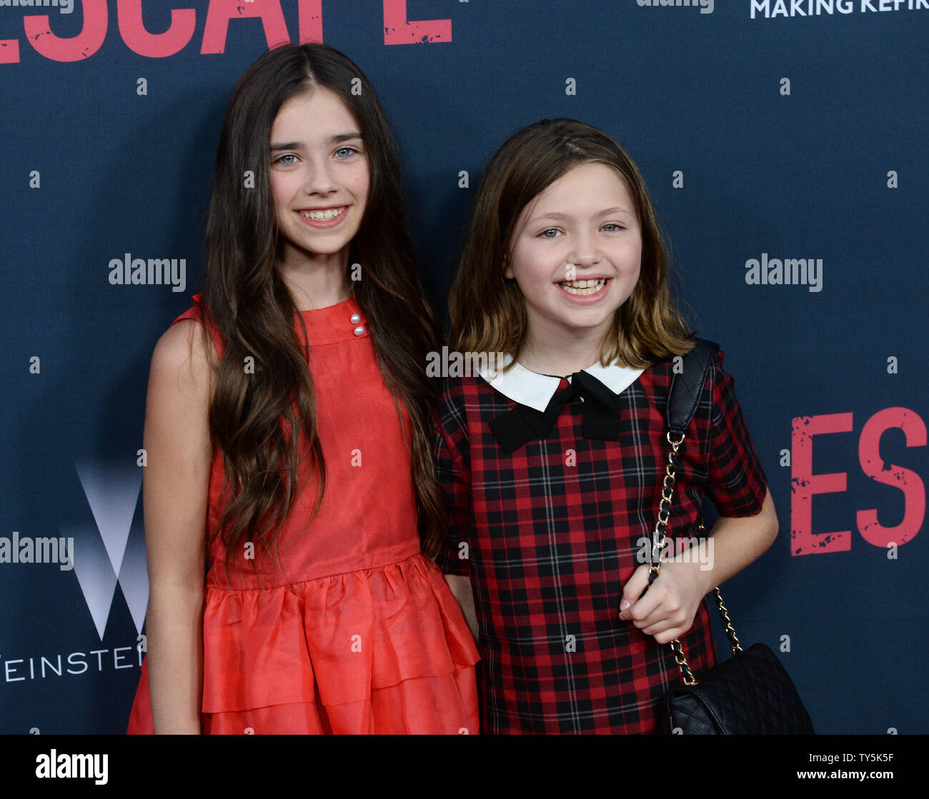 Cast members Sterling Jerins (L) and Claire Geare attend the premiere